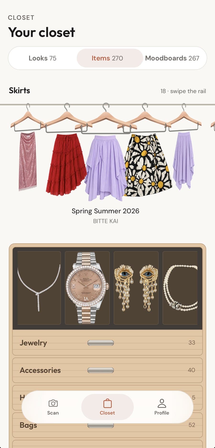 Skirts on a rail above an open jewelry drawer: a diamond necklace, a watch, drop earrings, pearls